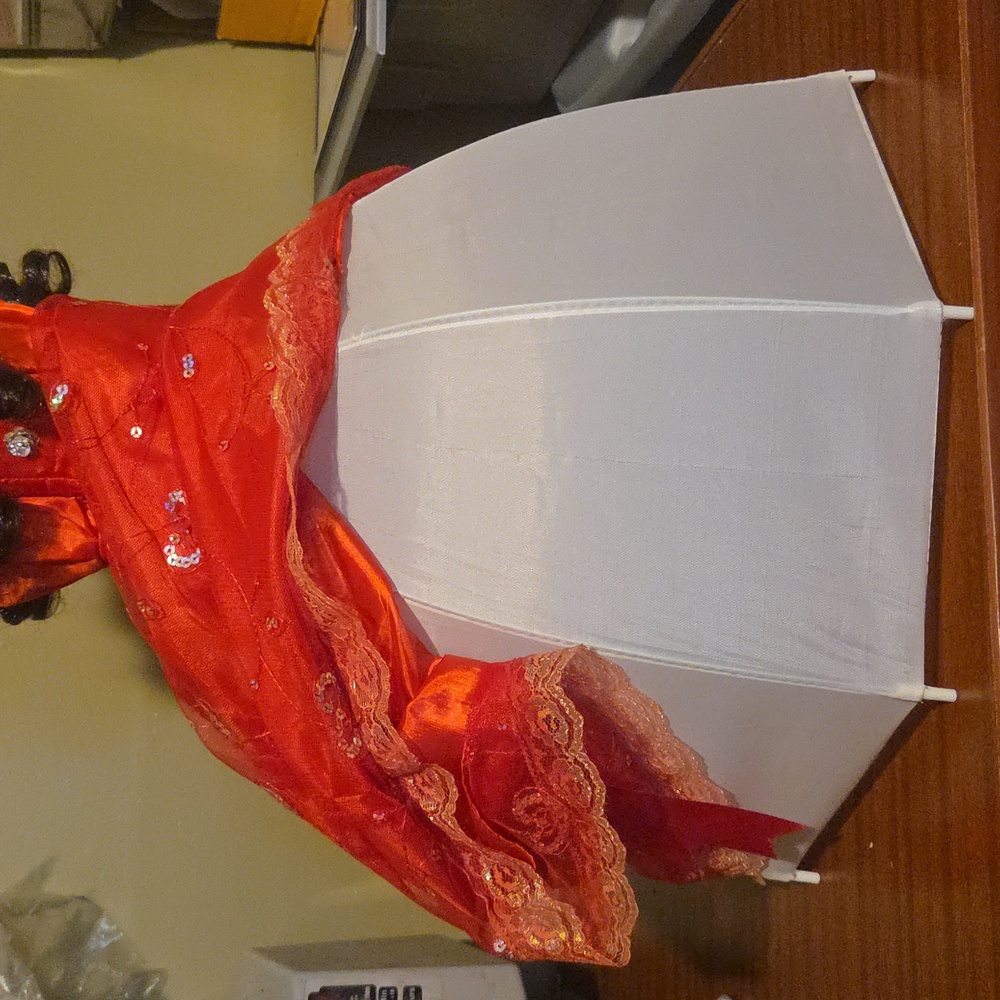 Charming Orange and Black Doll with Curly Hair - Picture 5 of 9
